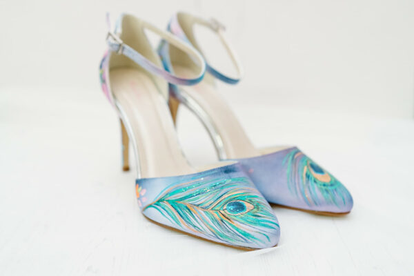 wedding shoes hand painted with peacock feathers